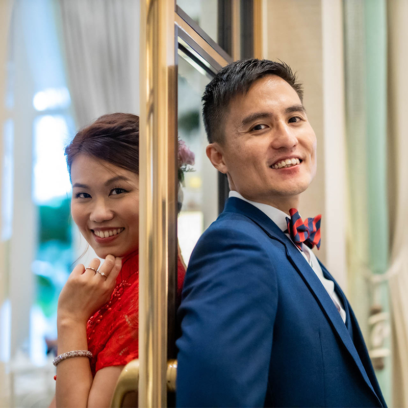 Couple back to back wedding image